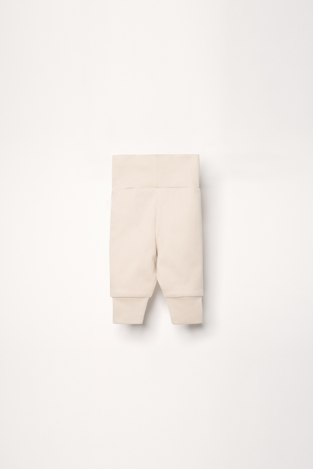 Baby pants in color sand with embroidered heart