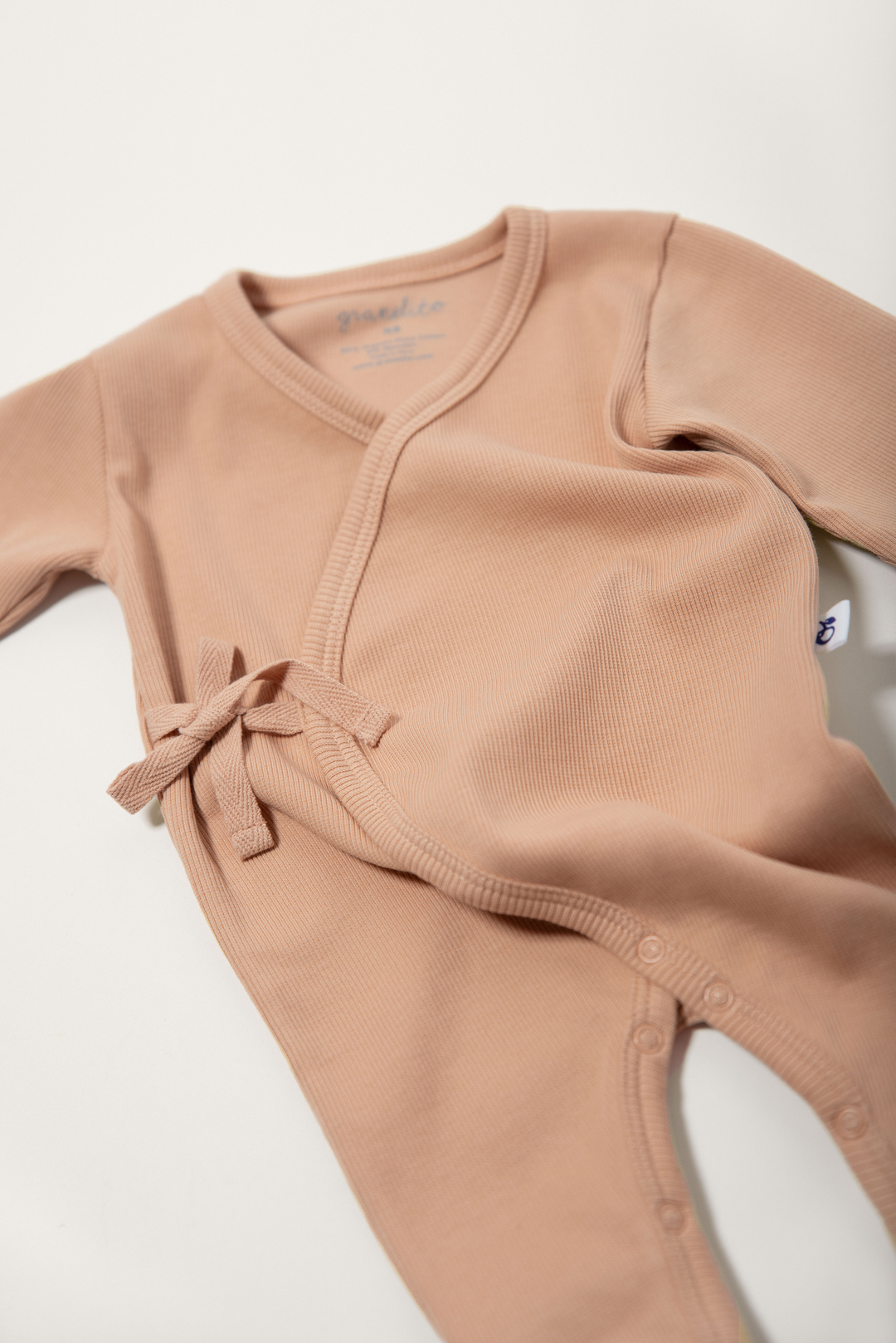 Ribbed pink kimono baby jumpsuit
